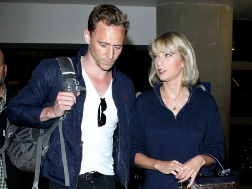 Picture Shows: Tom Hiddleston, Taylor Swift July 06, 2016 Tom Hiddleston and Taylor Swift arrive at LAX Airport from Rhode Island in Los Angeles, California. The couple dressed alike in navy blue hues. Non Exclusive UK RIGHTS ONLY (News International & Trinity Mirror Titles Only For Newspaper / No Associated Press Or Express Group EVER For Papers & Web) Pictures by : FameFlynet UK ¿ 2016 Tel : +44 (0)20 3551 5049 Email : info@fameflynet.uk.com